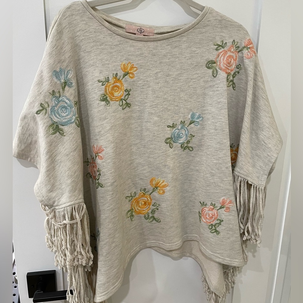 Floral embroidered poncho sweater